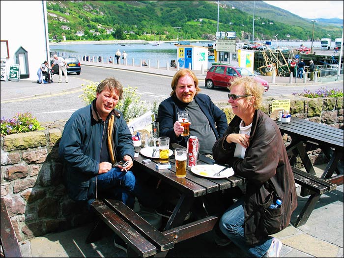 Lars, Ian and Trine enjoying a meal outside 